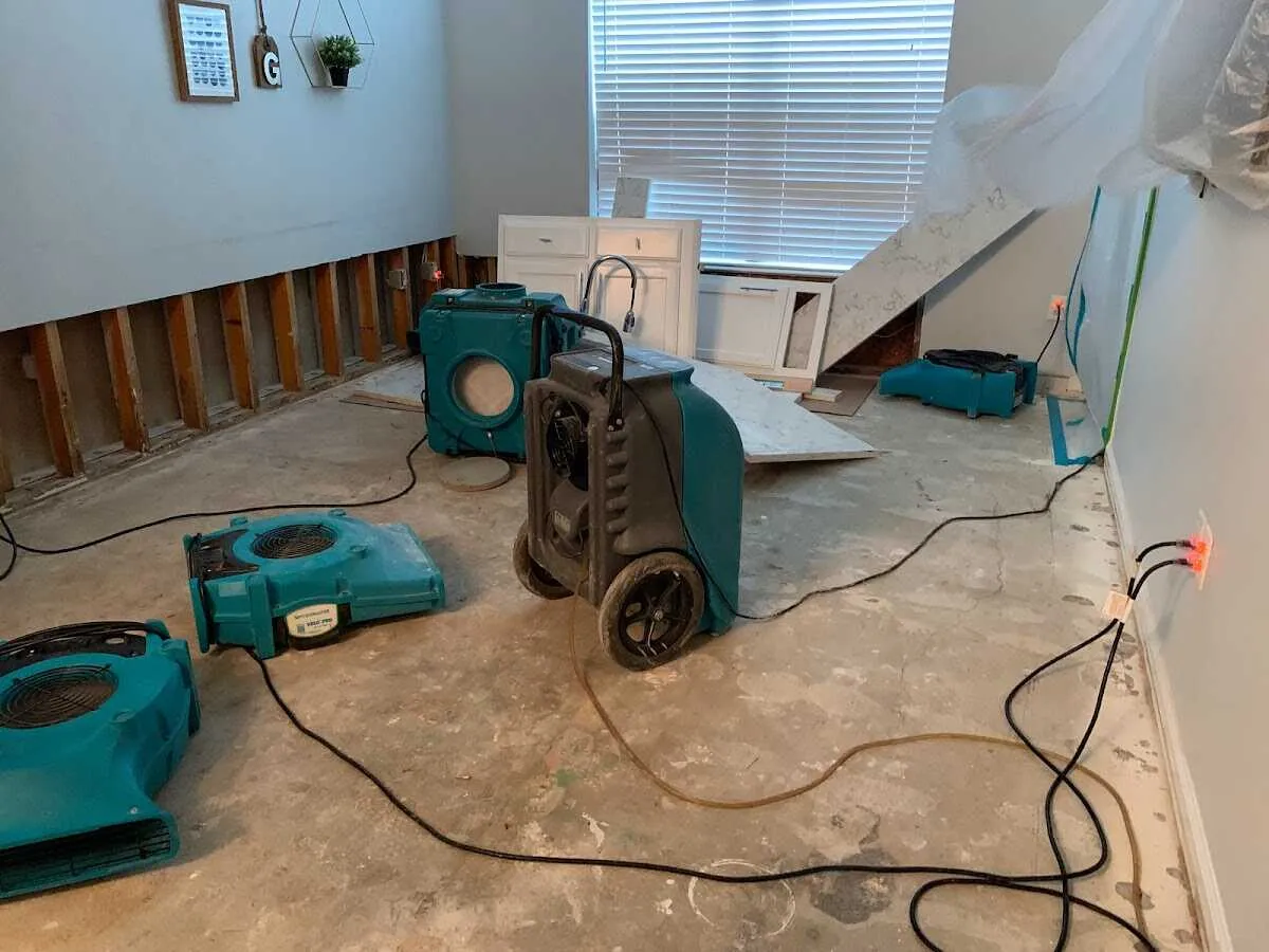 Dehumidifier in flood-cut room for Water Damage Restoration in West St. Paul